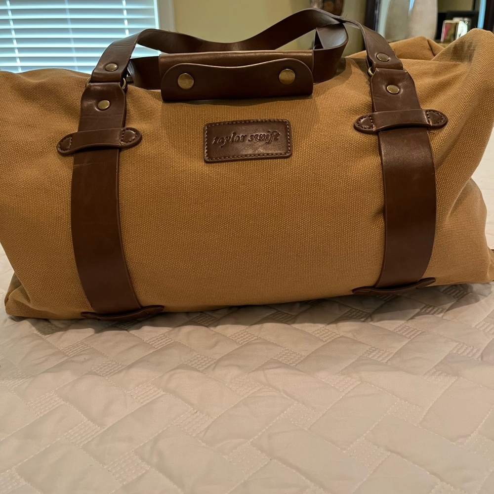 Authentic Taylor Swift duffle back never used